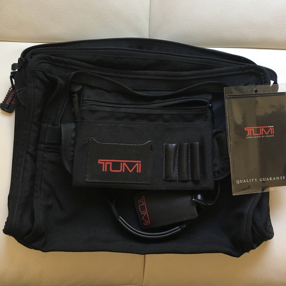 Tumi double gusset briefcase in black canvas